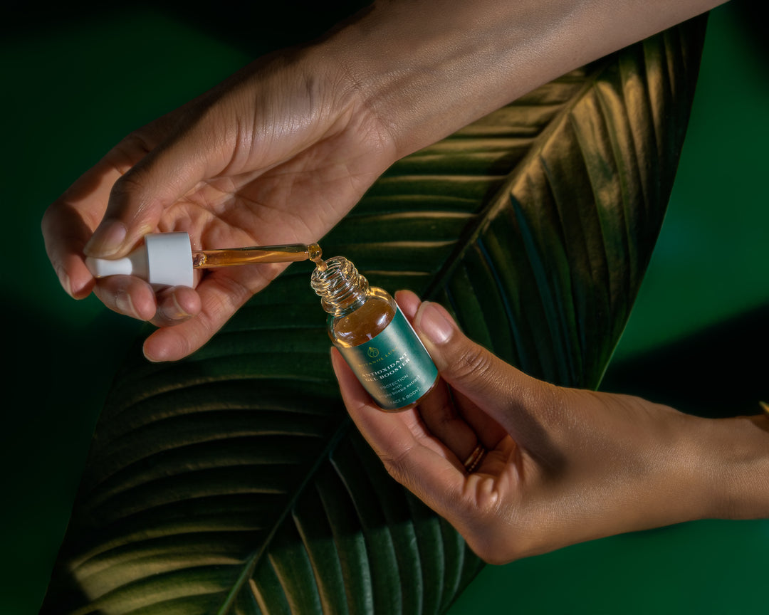 Antioxidant Gel booster held in hand showing texture of product